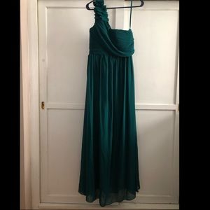 Emerald green, long, one shoulder dress.